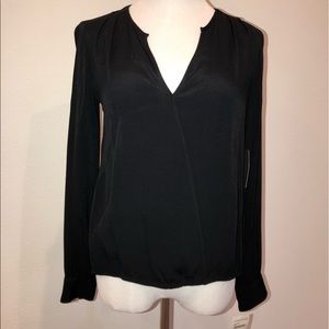 Black long sleeved Trouvé blouse from Nordstrom.